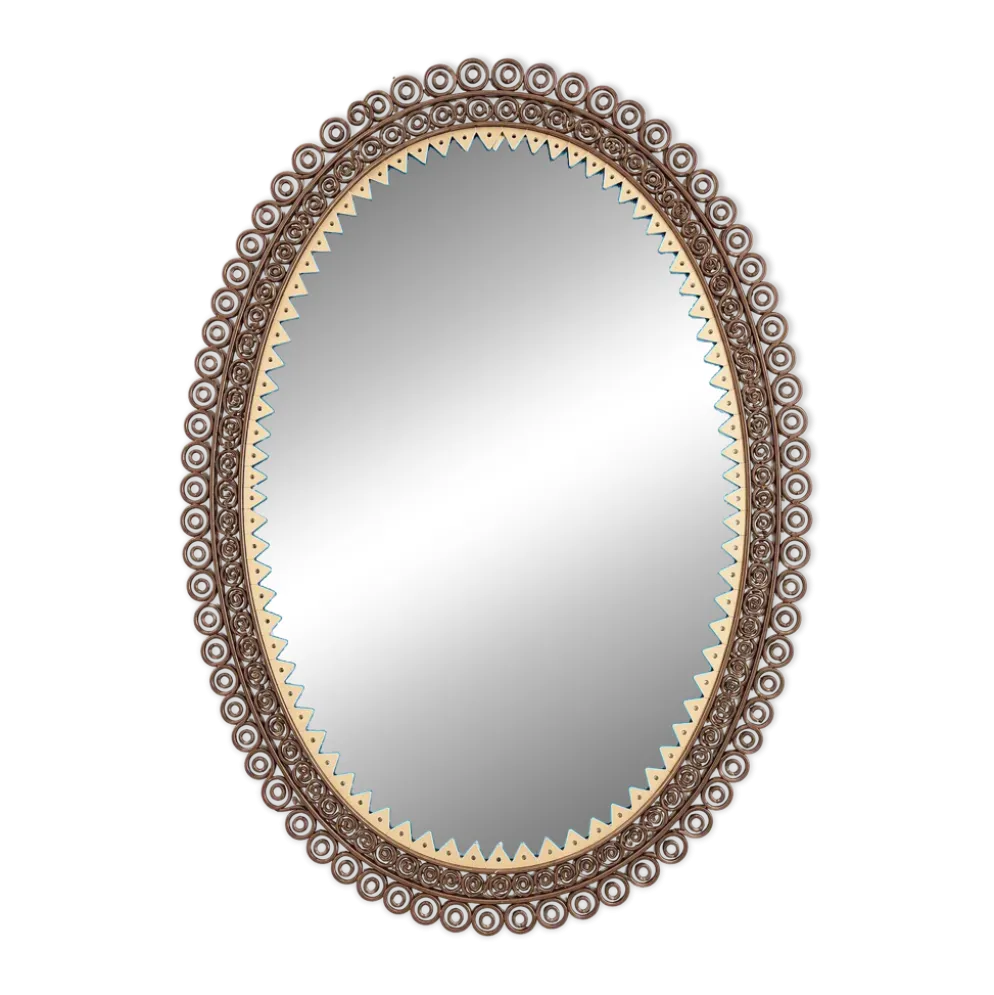 Miroir cisele entouré de metal