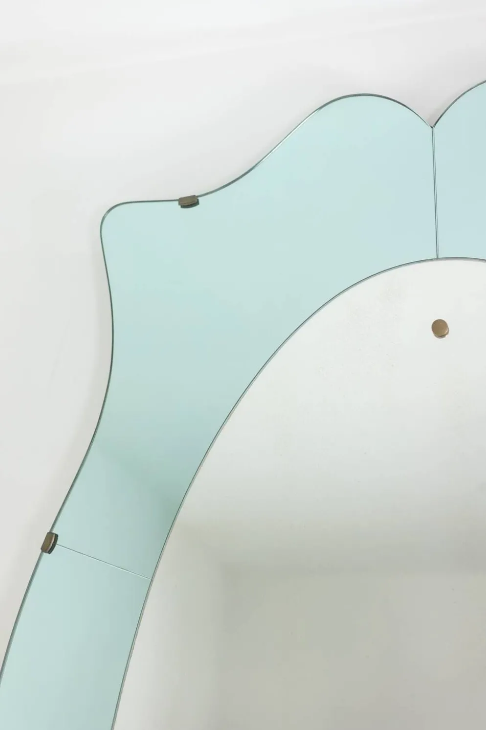 Miroir-console en verre bicolore et laiton doré. Circa 1950.