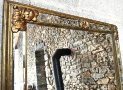 Miroir Deknudt doré biseauté à parcloses Belgique XXème