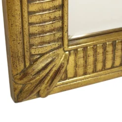 Miroir Deknudt en or Hollywood Regency biseauté 92 cm