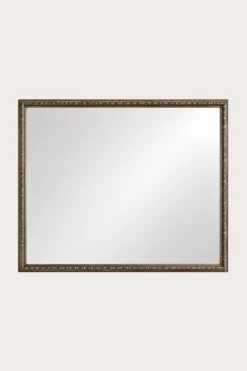 Miroir de parquet, cadre doré à frise de perles