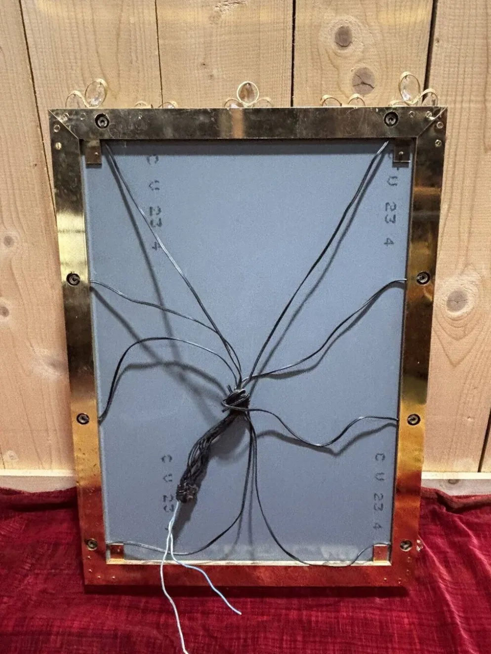 Miroir de salle de bain en métal doré