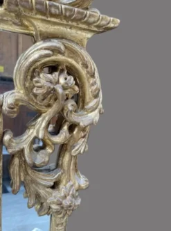 Miroir de style Régence en bois doré, 1ère moitié XIXÈME