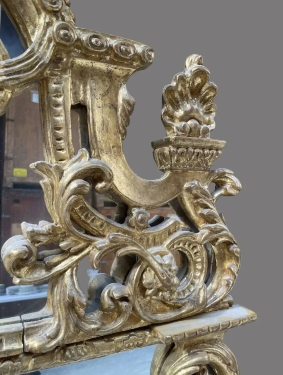 Miroir de style Régence en bois doré, 1ère moitié XIXÈME