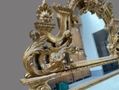 Miroir de style Régence en bois doré, 1ère moitié XIXÈME