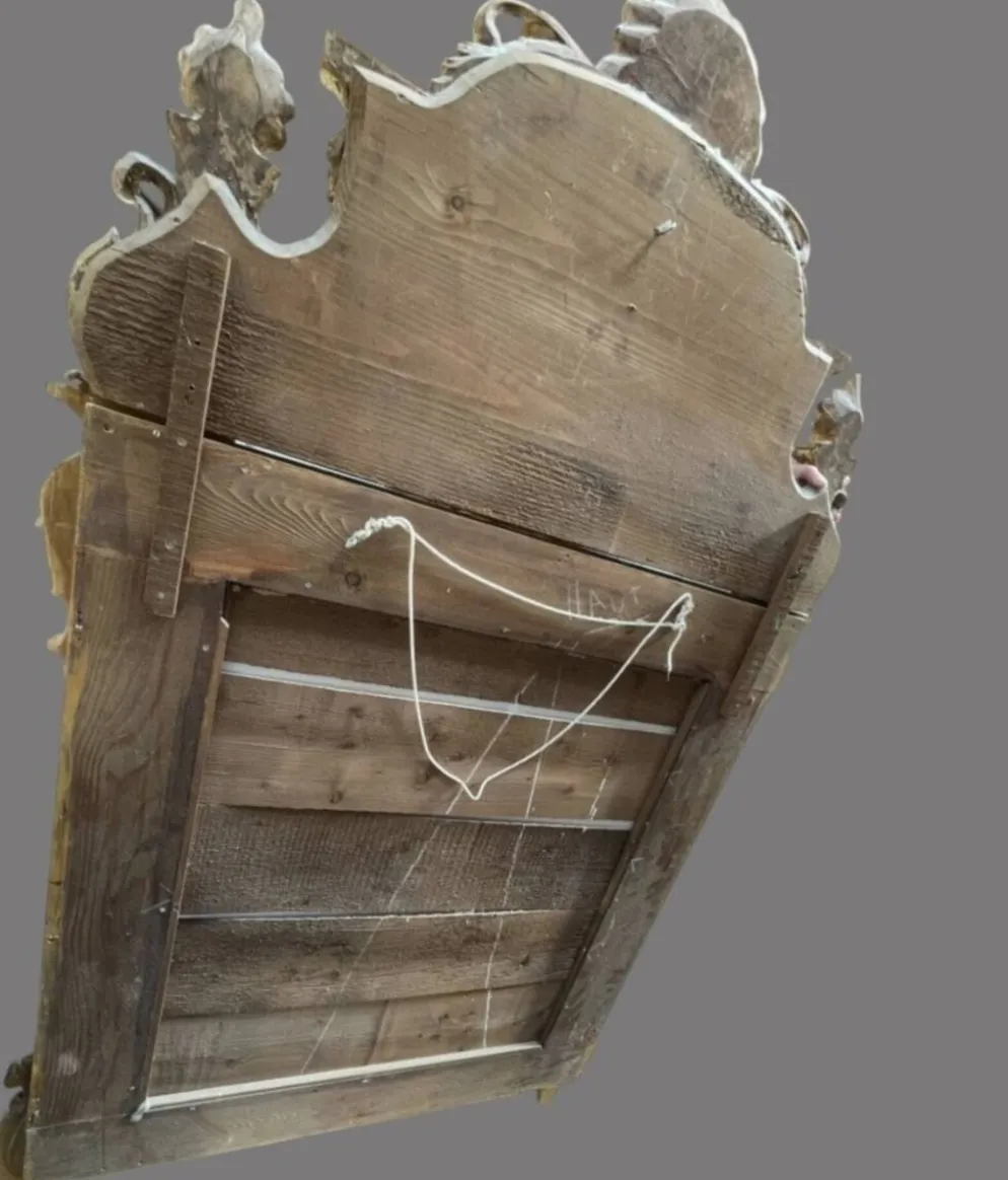 Miroir de style Régence en bois doré, 1ère moitié XIXÈME