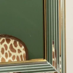 Miroir « Disco » DeKnudt des années 1980, avec cadre biseauté à plusieurs niveaux et bordure dorée.