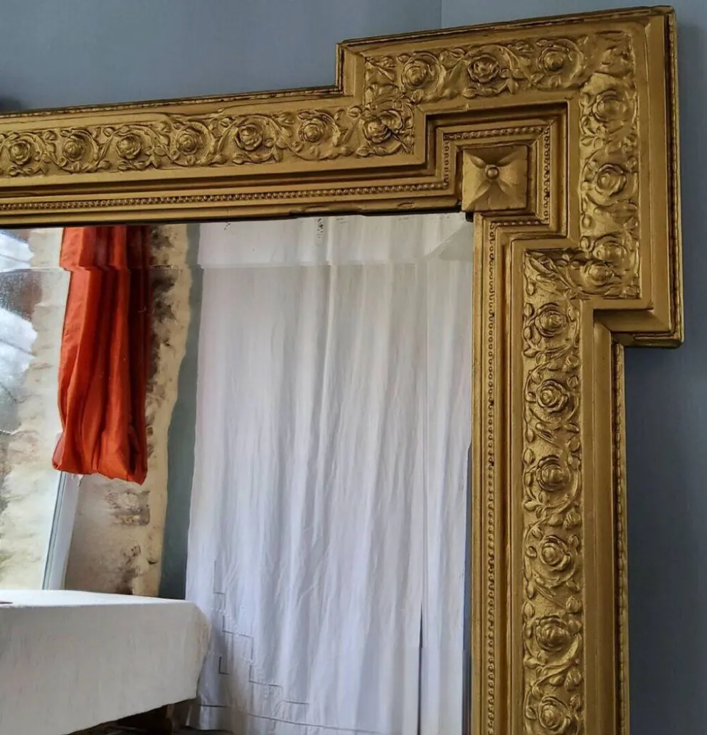 Miroir doré biseauté