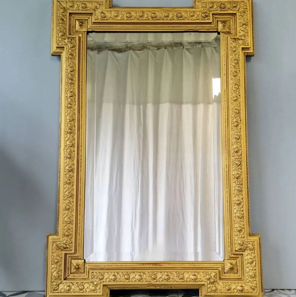 Miroir doré biseauté