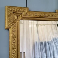 Miroir doré biseauté
