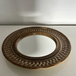 Miroir en grès bouchardé