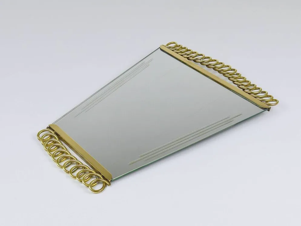 Miroir en laiton à décor de boucles attribué à Josef Frank, Autriche, années 1950