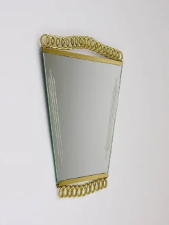 Miroir en laiton à décor de boucles attribué à Josef Frank, Autriche, années 1950