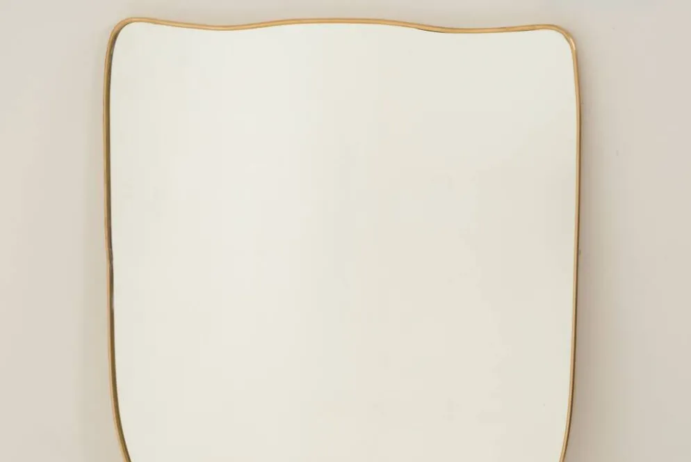 Miroir en laiton doré dans le style de Gio Ponti et des années 1980.