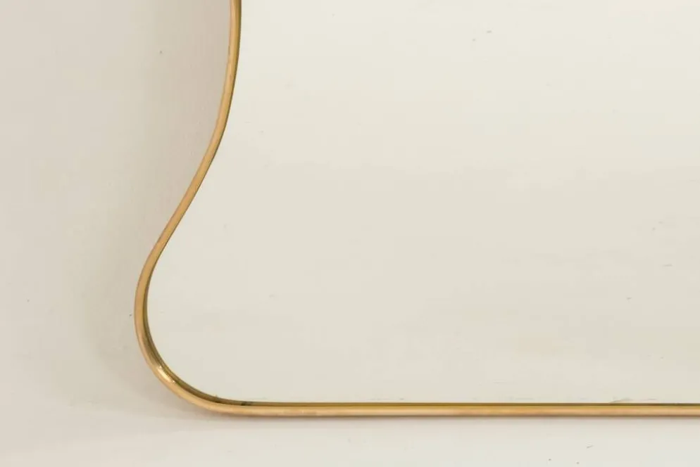 Miroir en laiton doré dans le style de Gio Ponti et des années 1980.
