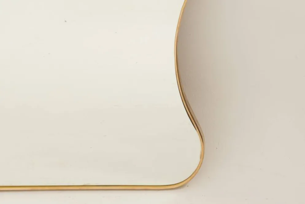 Miroir en laiton doré dans le style de Gio Ponti et des années 1980.