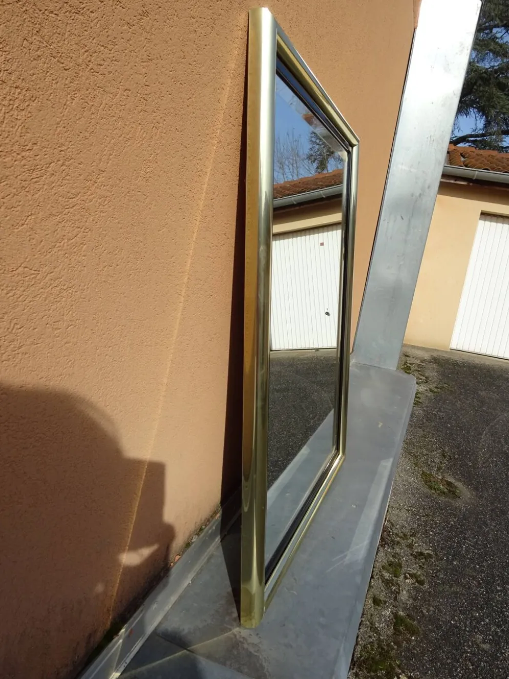 Miroir en laiton et plexiglas, années 80