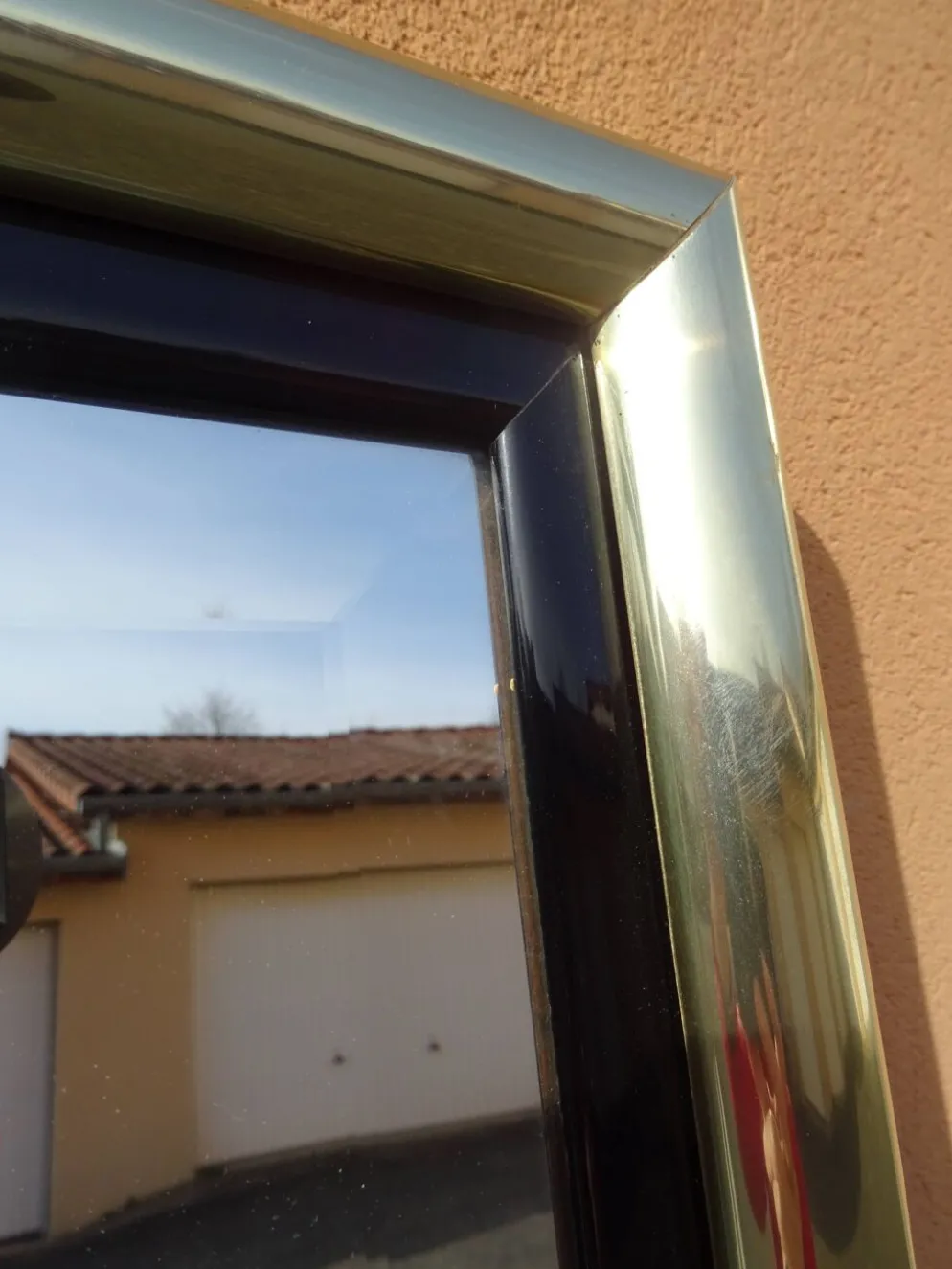 Miroir en laiton et plexiglas, années 80