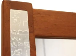 Miroir en teck avec accents argentés