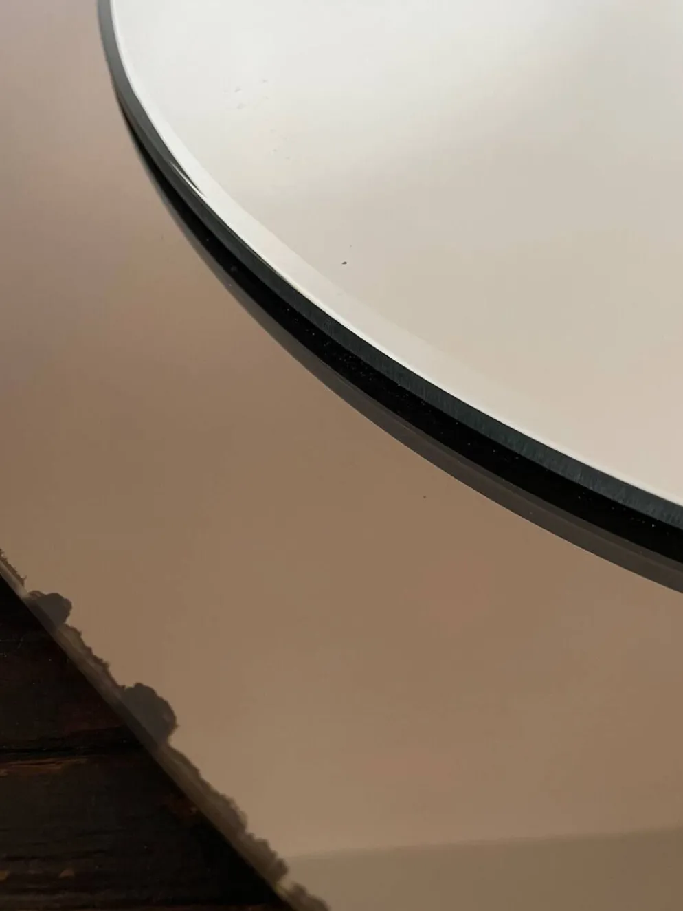 Miroir en verre fumé bicolore, vers 1970