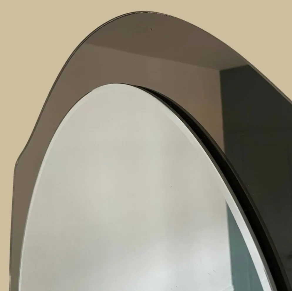 Miroir en verre fumé bicolore, vers 1970