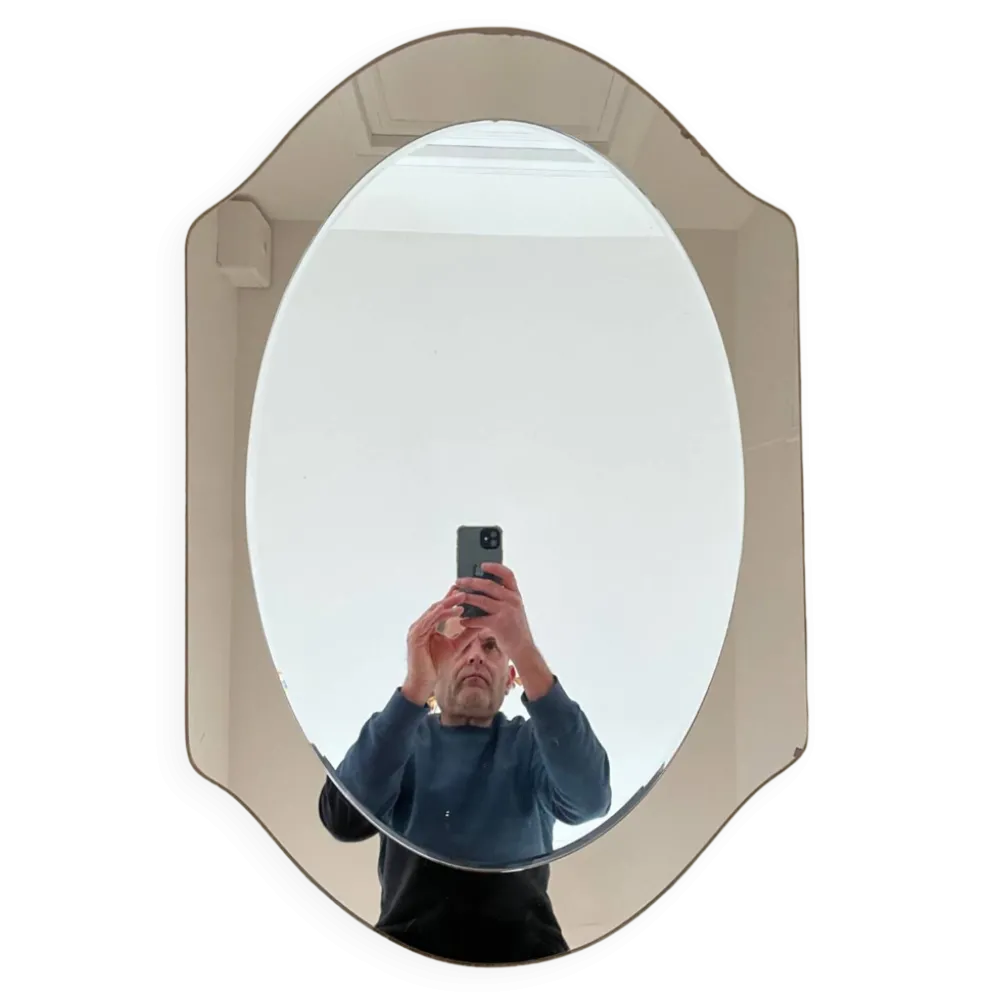 Miroir en verre fumé bicolore, vers 1970