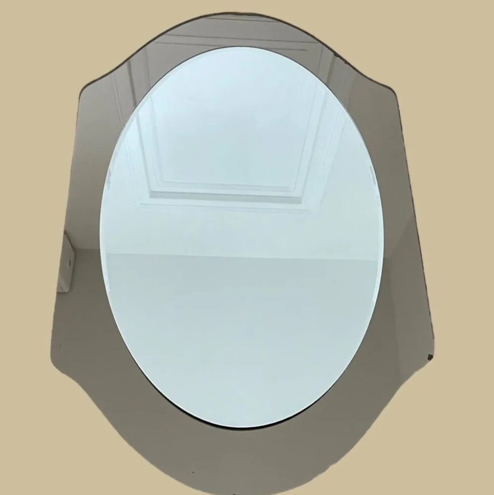Miroir en verre fumé bicolore, vers 1970