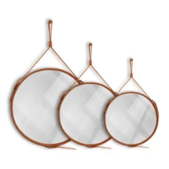 Miroir fait main de style J. Adnet en cuir tanné végétal de couleur tan, ø 45 cm