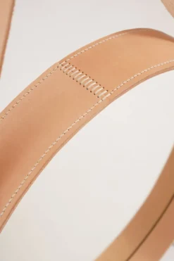 Miroir fait main de style J. Adnet en cuir végétal tanné naturel, ø 58 cm