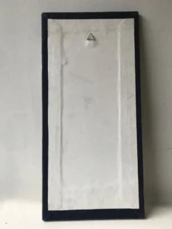 Miroir fleur en céramique.