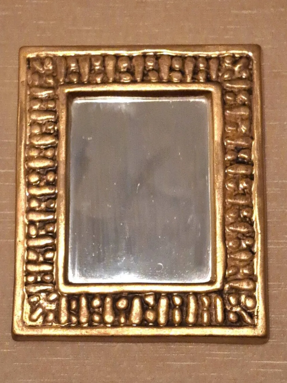 Miroir François Lembo en céramique doré