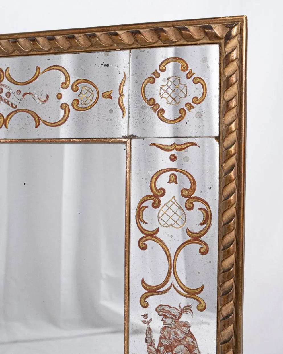 Miroir italien en verre églomisé, à parecloses, début XXe siècle