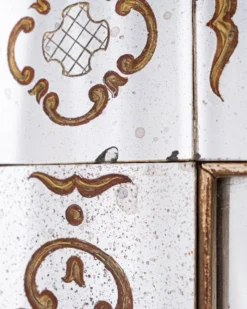 Miroir italien en verre églomisé, à parecloses, début XXe siècle