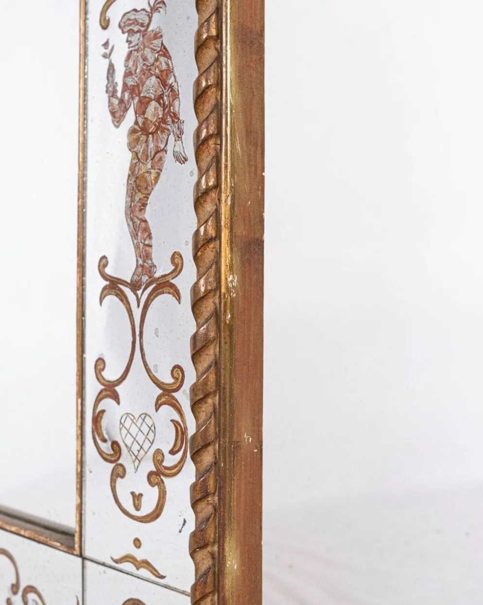 Miroir italien en verre églomisé, à parecloses, début XXe siècle
