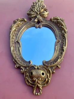 Miroir mural décoratif ovale de style Louis XV