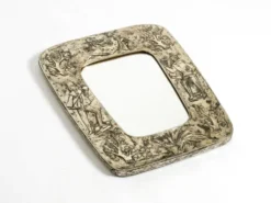 Miroir mural de style mid-century moderne avec un cadre en argent.