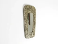 Miroir mural de style mid-century moderne avec un cadre en argent.
