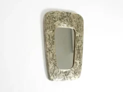 Miroir mural de style mid-century moderne avec un cadre en argent.