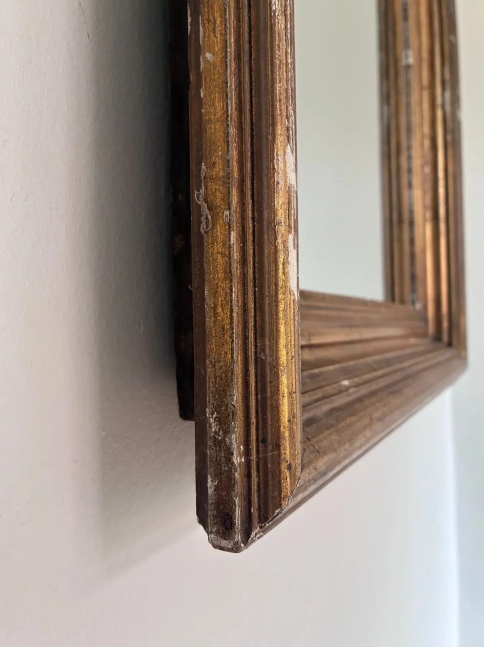 Miroir mural en bois doré antique en or