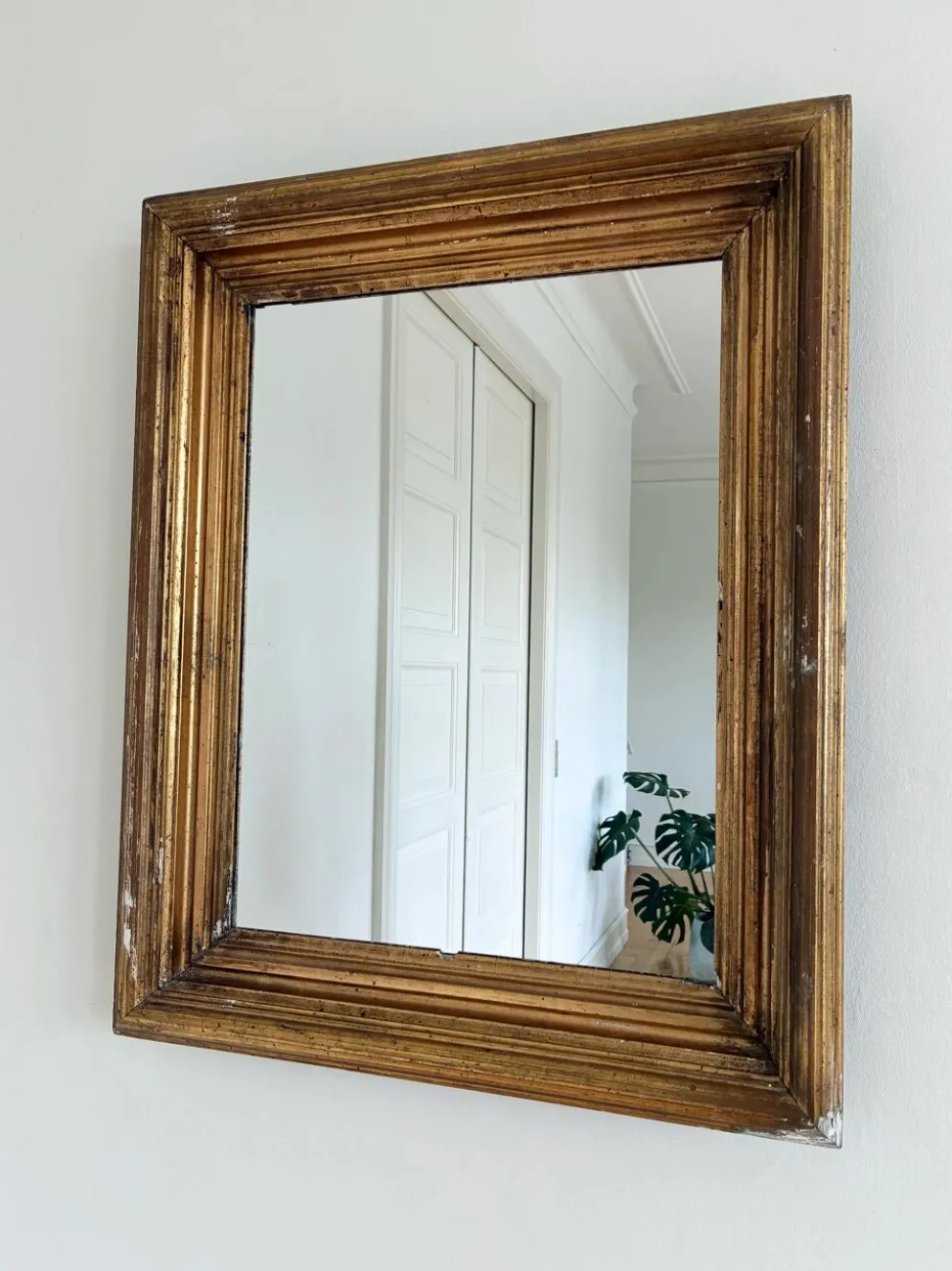 Miroir mural en bois doré antique en or