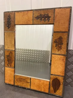 Miroir mural en céramique décor herbier vers 1960