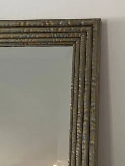 Miroir mural en métal texturé embossé et miroir biseauté