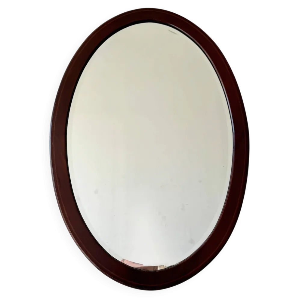Miroir mural ovale en acajou ancien