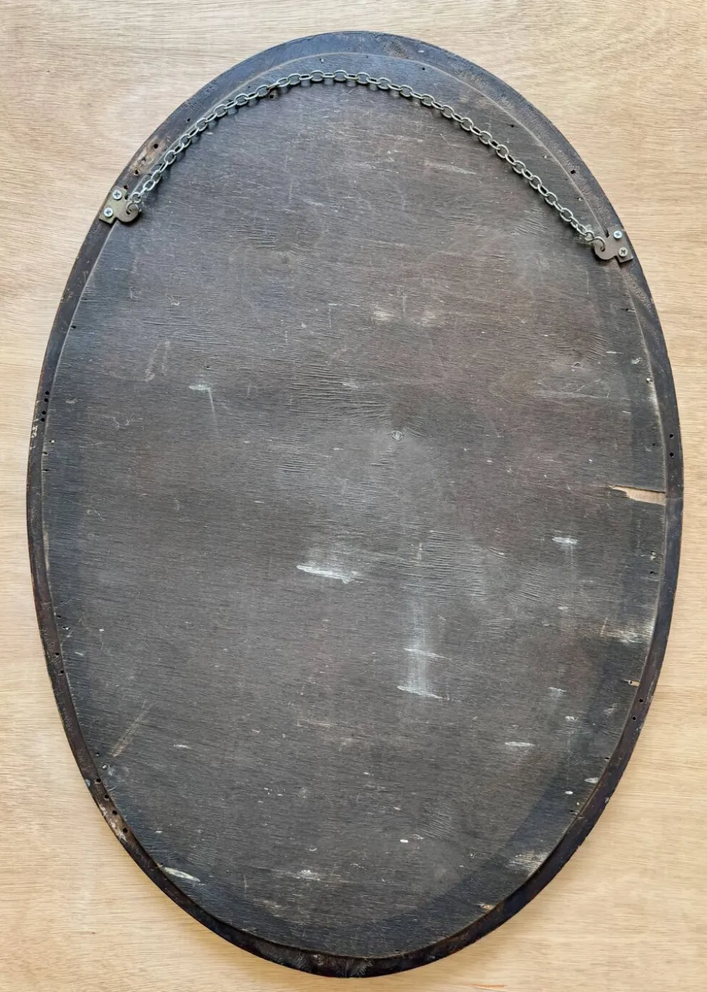Miroir mural ovale en acajou ancien