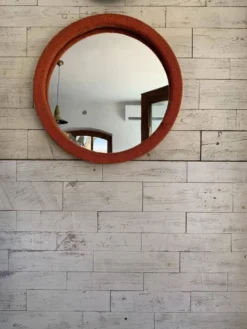 Miroir mural rond orange corail en bois recouvert de tissu - style Mid‑Century, 1950s