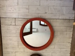 Miroir mural rond orange corail en bois recouvert de tissu - style Mid‑Century, 1950s