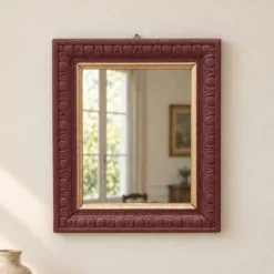 Miroir mural vintage en bois sculpté bordeaux et doré – style Art déco – H4