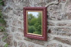 Miroir mural vintage en bois sculpté bordeaux et doré – style Art déco – H4