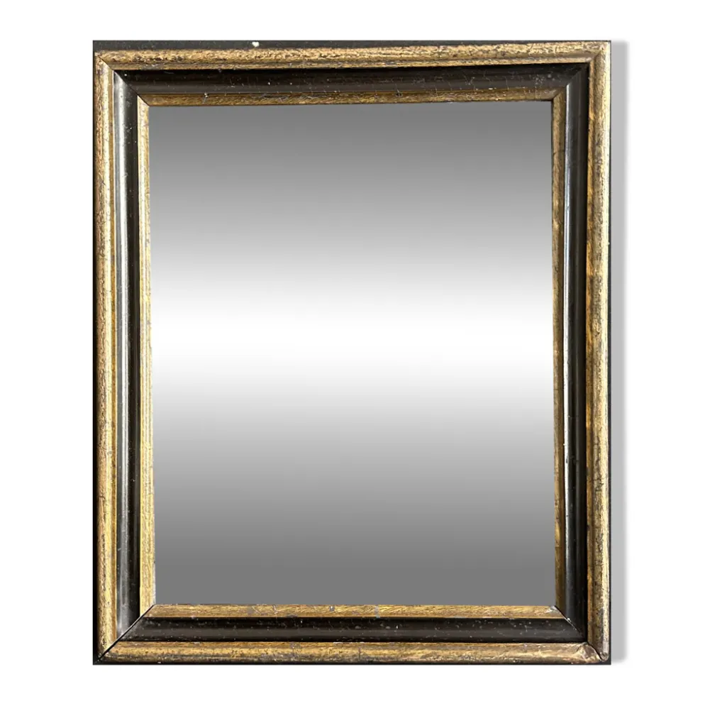 Miroir Napoléon III en bois noir et doré, XIXe siècle