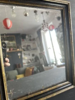 Miroir Napoléon III en bois noir et doré, XIXe siècle